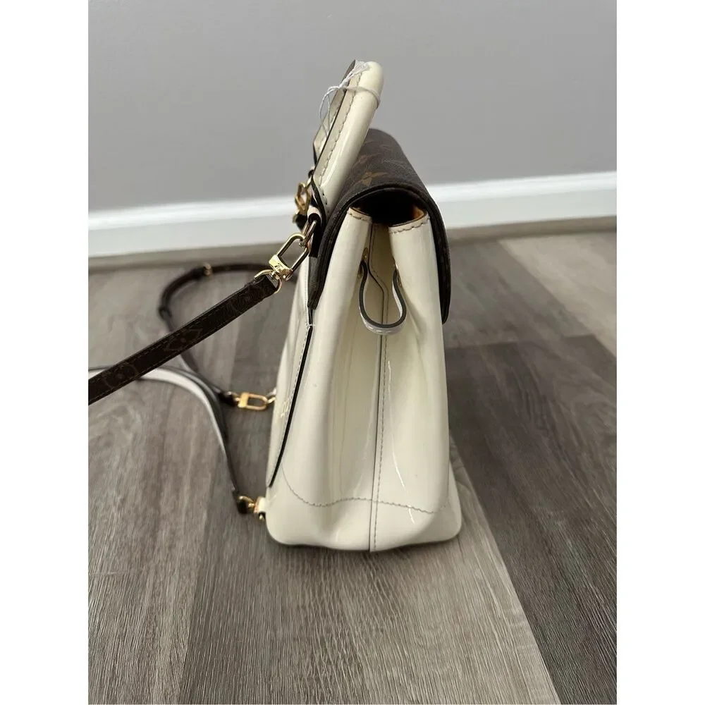 Louis Vuitton Patent Monogram Hot Springs Backpack Snow